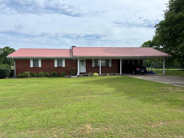 single story home featuring a carport and a front lawn