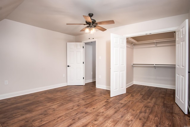 unfurnished bedroom featuring a closet, ceiling fan, and dark hardwood / wood-style floors