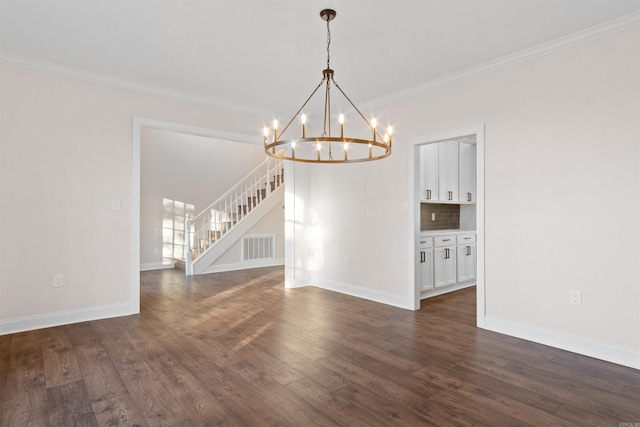 kitchen featuring dark hardwood / wood-style flooring, decorative backsplash, ornamental molding, sink, and appliances with stainless steel finishes