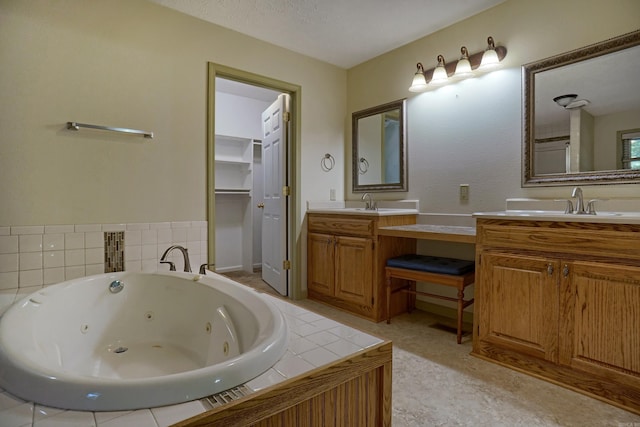 bathroom with double vanity and tile patterned floors