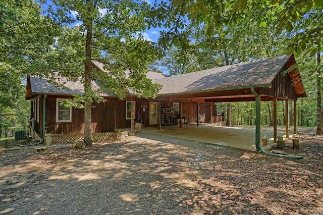 exterior space featuring a carport