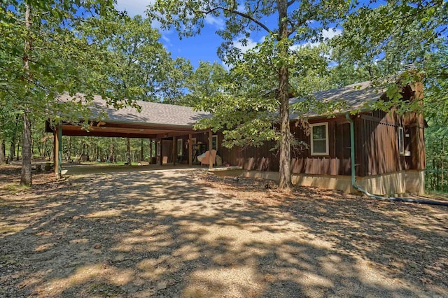 view of front of home with a carport