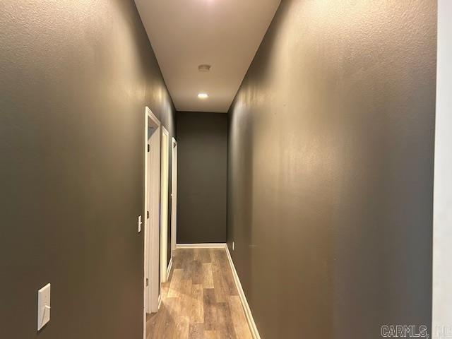 1334 Sutterfield Rd, Fox, AR 72051 - hall featuring wood finished floors and baseboards
