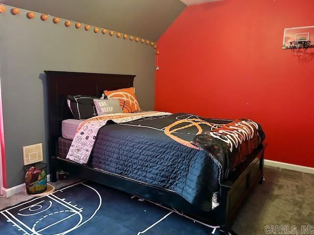 1334 Sutterfield Rd, Fox, AR 72051 - bedroom with carpet floors, vaulted ceiling, and baseboards