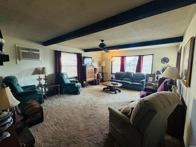 carpeted living room with beamed ceiling, ceiling fan, and a textured ceiling