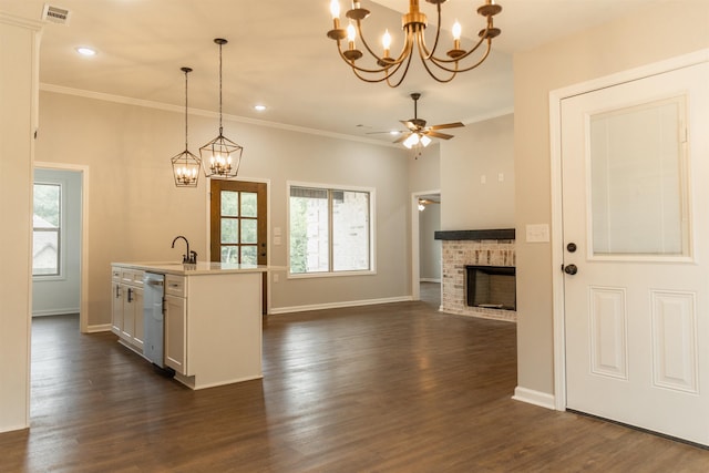 9 Jeremiah Cv, Heber Springs, AR 72543 - kitchen featuring pendant lighting, plenty of natural light, dishwasher, and an island with sink