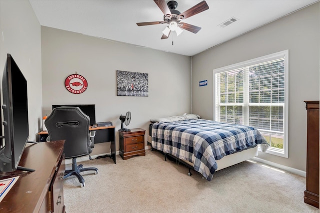 carpeted bedroom featuring ceiling fan