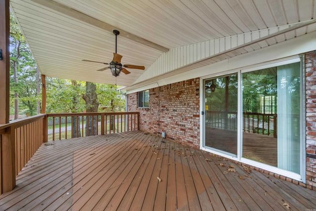 wooden terrace featuring ceiling fan