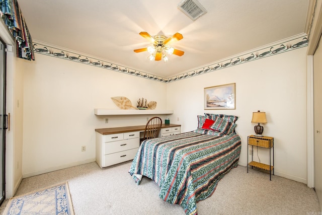 bedroom featuring light carpet and ceiling fan