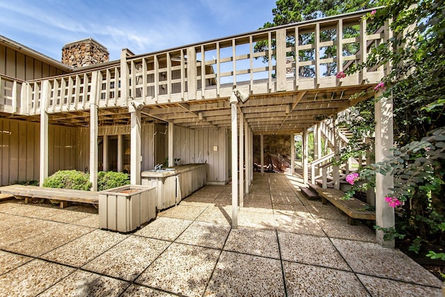 view of patio with a wooden deck