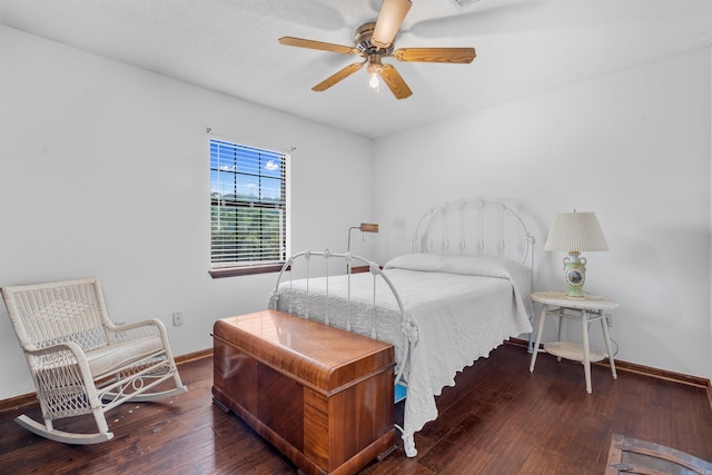 bedroom featuring wood-type flooring and ceiling fan