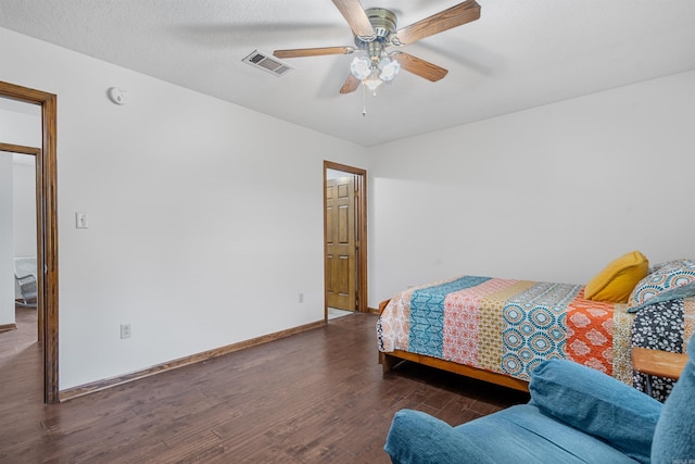 bedroom featuring wood-type flooring and ceiling fan