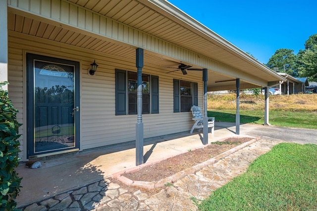 exterior space with covered porch and ceiling fan