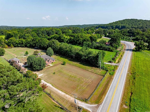 bird's eye view featuring a rural view and a view of trees