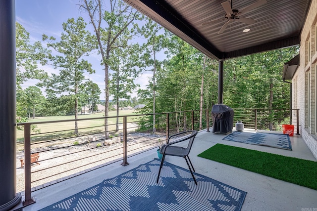 view of patio / terrace featuring a balcony, ceiling fan, and area for grilling