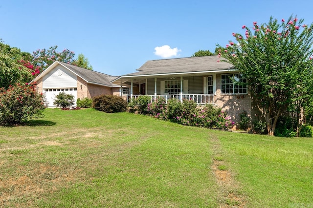 single story home featuring a garage and a front lawn