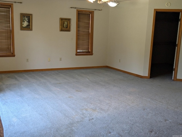 empty room featuring carpet flooring