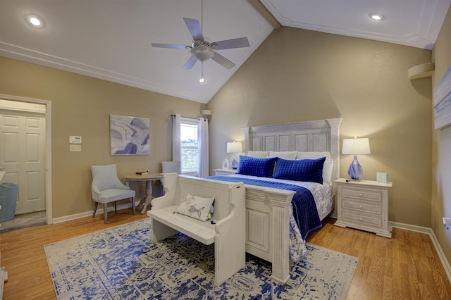 bedroom featuring lofted ceiling, ceiling fan, light wood-type flooring, and baseboards