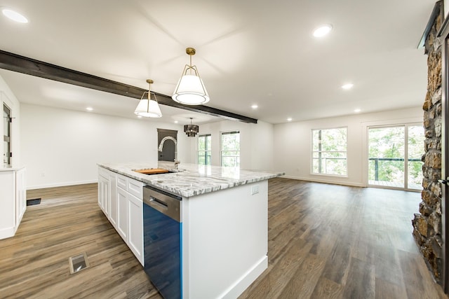 kitchen featuring sink, white cabinetry, dishwasher, pendant lighting, and a kitchen island with sink