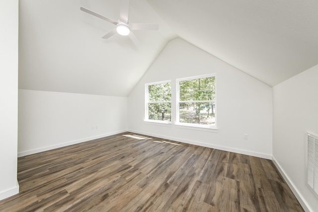 bonus room featuring ceiling fan, lofted ceiling, and dark hardwood / wood-style flooring