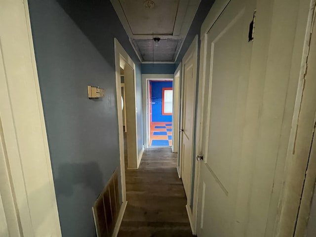 corridor with dark wood-type flooring