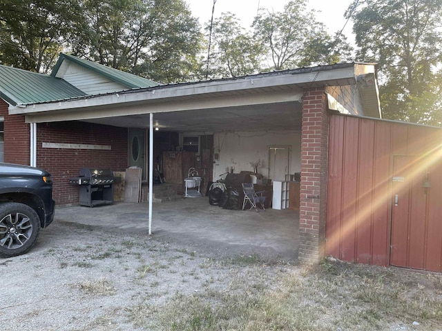 view of home's exterior with a carport