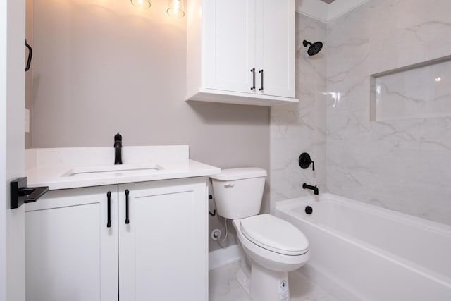 full bathroom featuring tiled shower / bath, vanity, and toilet