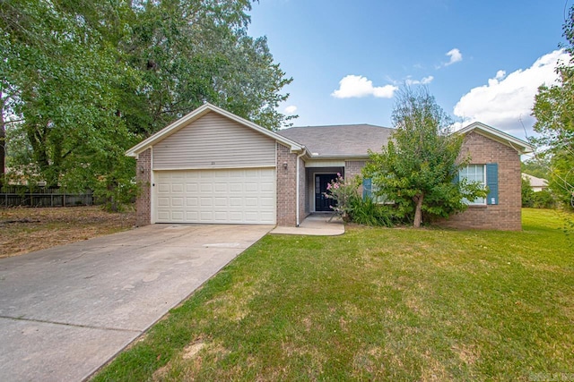 ranch-style home with a garage and a front lawn