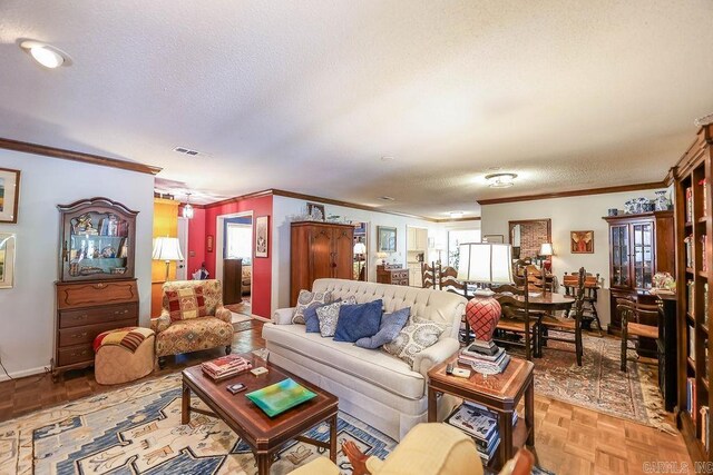 living room featuring light parquet floors, crown molding, and a healthy amount of sunlight