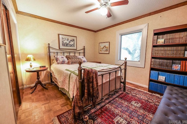 bedroom with ceiling fan, parquet flooring, a textured ceiling, and crown molding