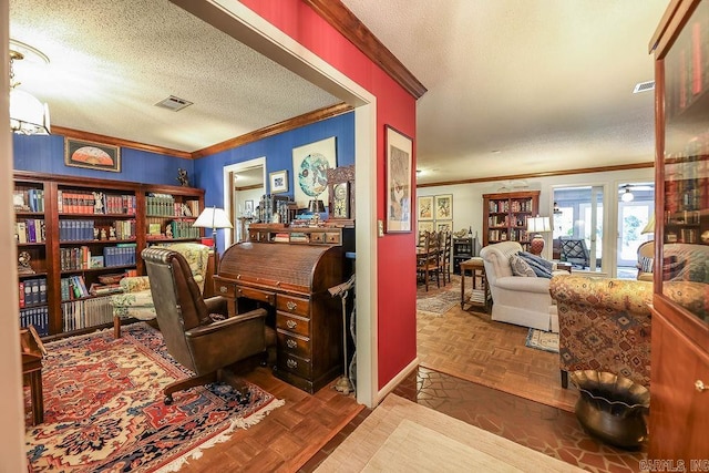 office area featuring parquet flooring, a textured ceiling, and ornamental molding