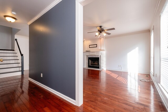 dining space with crown molding, dark hardwood / wood-style floors, and an inviting chandelier