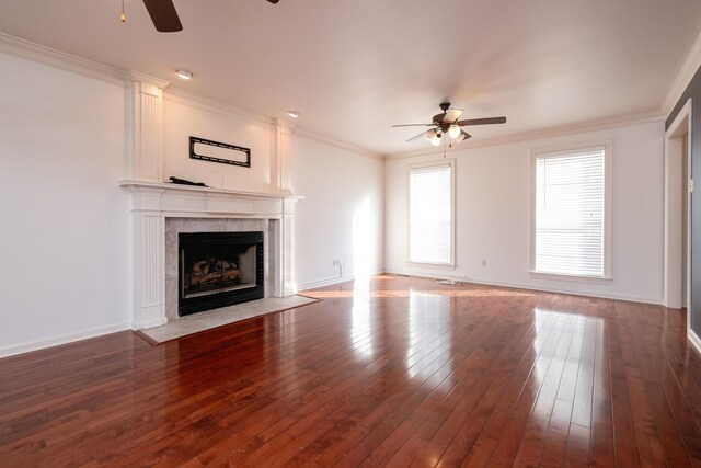 living room featuring ceiling fan, dark wood-type flooring, and crown molding