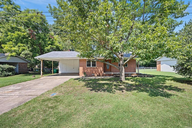 ranch-style house with crawl space, driveway, an attached carport, and a front yard