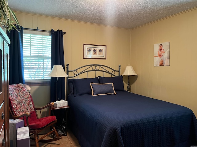 bedroom featuring a textured ceiling