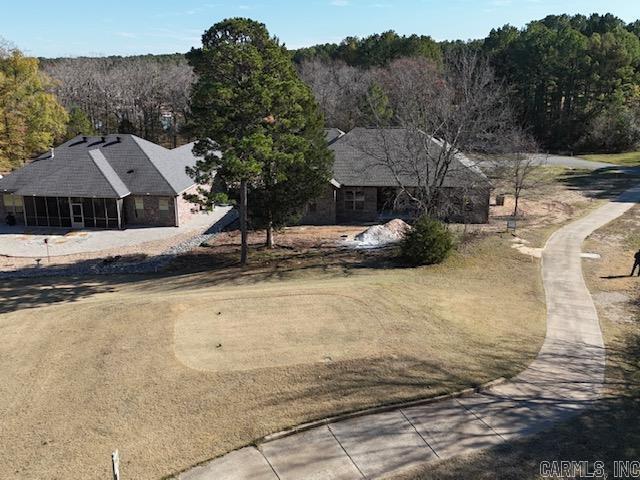 view of community featuring a lawn