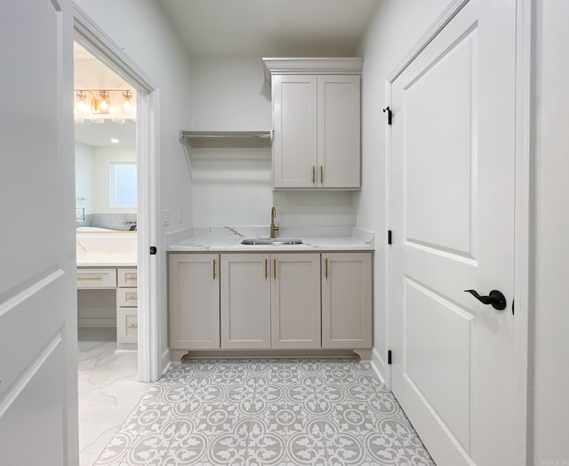 laundry area featuring sink