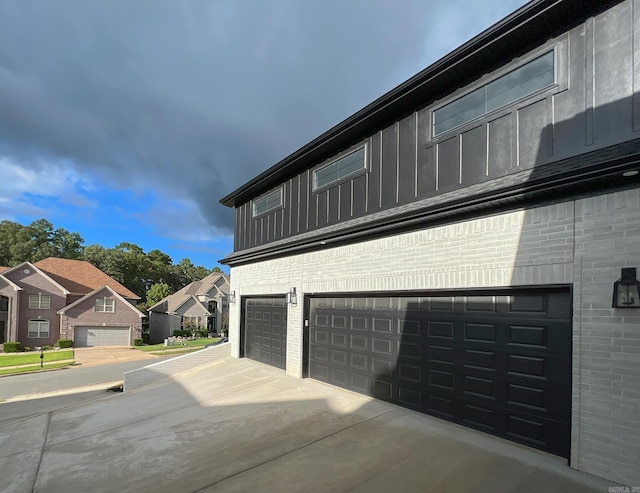 view of side of property featuring a garage