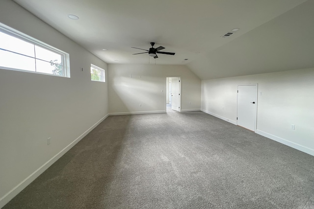 bonus room with ceiling fan, lofted ceiling, and carpet