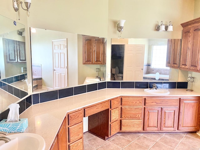 kitchen with light tile patterned flooring and sink