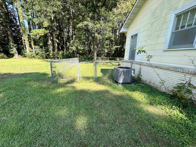 view of yard with central AC unit