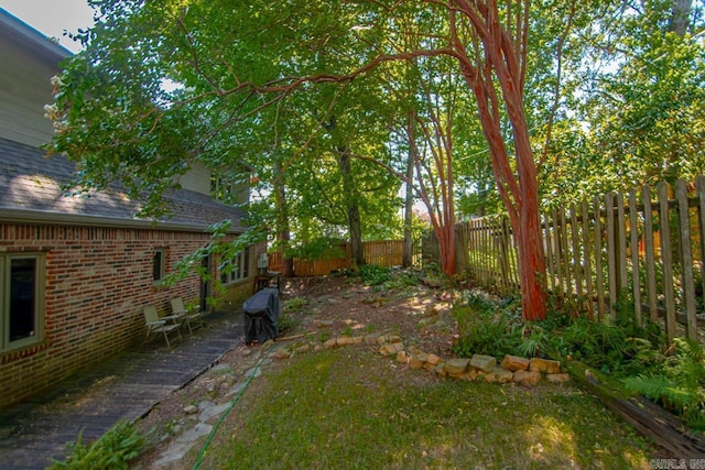 view of yard featuring a fenced backyard