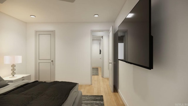 bedroom with light wood-type flooring