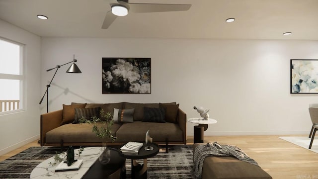 living room with ceiling fan and wood-type flooring