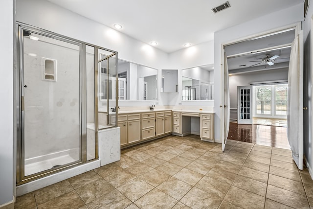 bathroom with visible vents, a ceiling fan, vanity, a shower stall, and recessed lighting