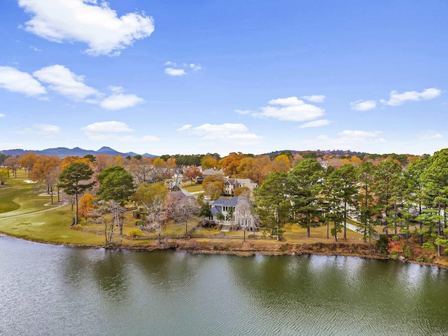 aerial view featuring a water and mountain view