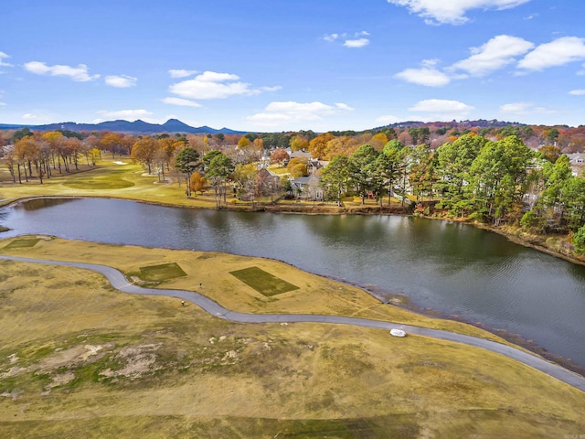 drone / aerial view with a water and mountain view