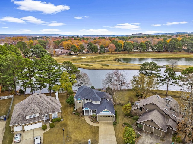 bird's eye view featuring a residential view and a water view