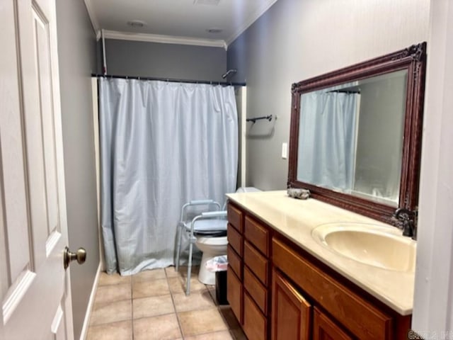 bathroom with vanity, crown molding, toilet, and tile patterned flooring