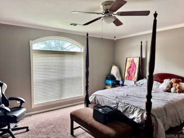 bedroom featuring carpet flooring, crown molding, and ceiling fan